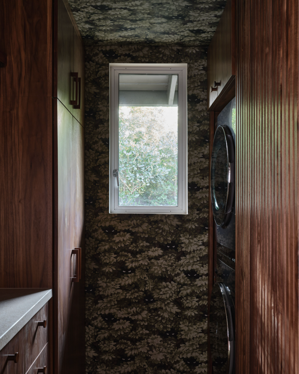 a completely renovated laundry room from the 70s