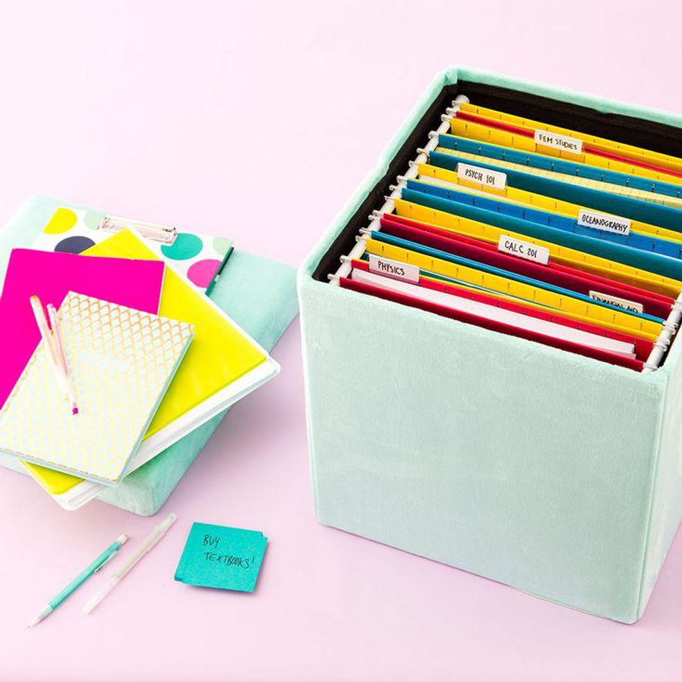 aqua colored DIY Ottoman Filing System