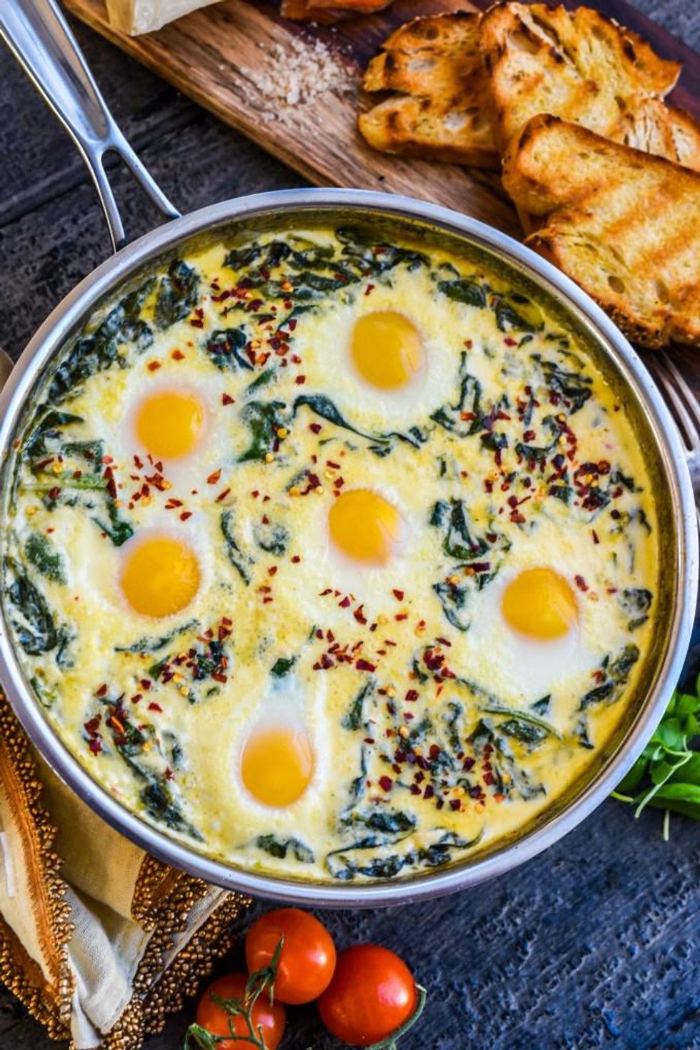 Baked Eggs in Ricotta Parmesan Creamed Spinach