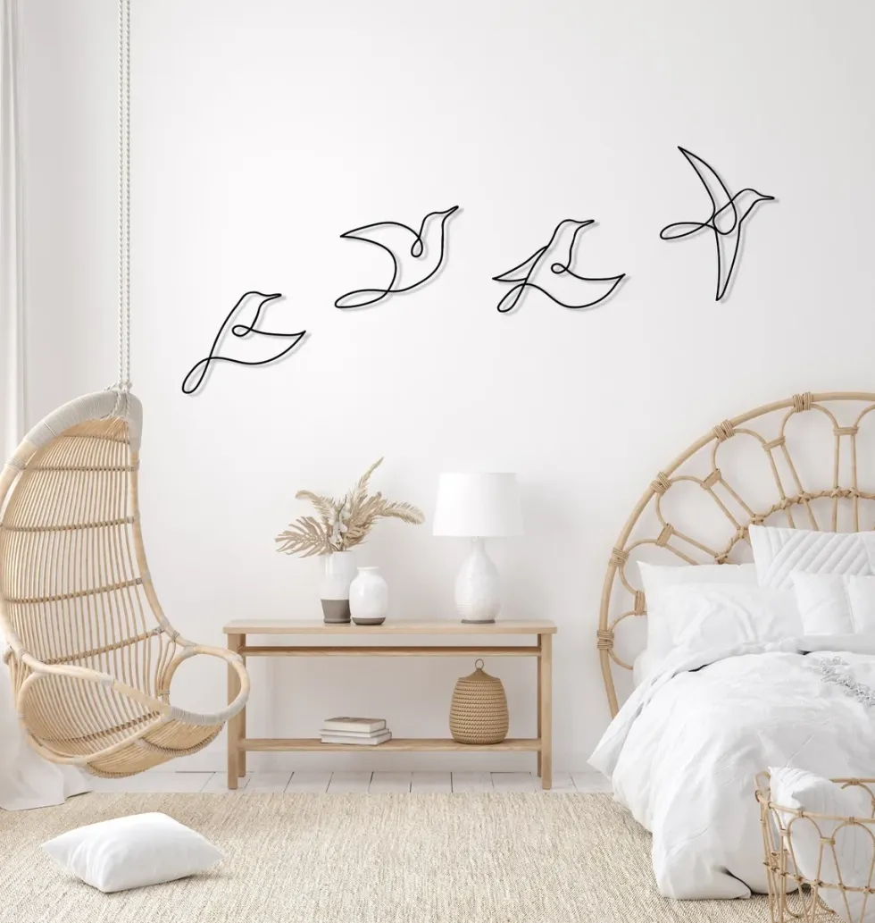 black metal bird wall art