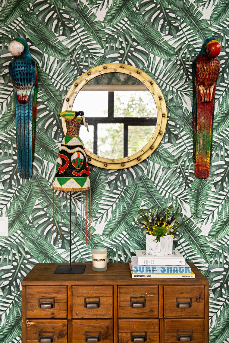 https://www.brit.co/media-library/boho-wall-with-leaf-wallpaper-and-circular-mirror.jpg?id=29534361&width=760&quality=90