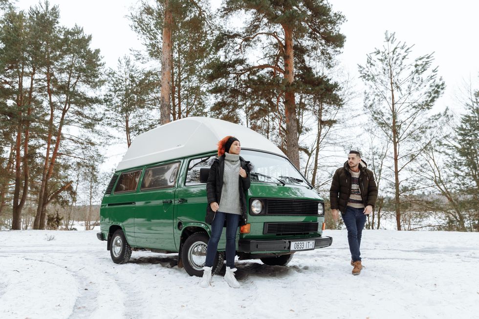 Couple by their campervan