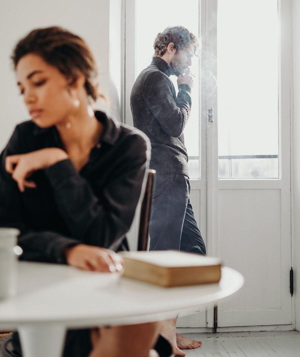 couple having a misunderstanding in their apartment Gaslighting