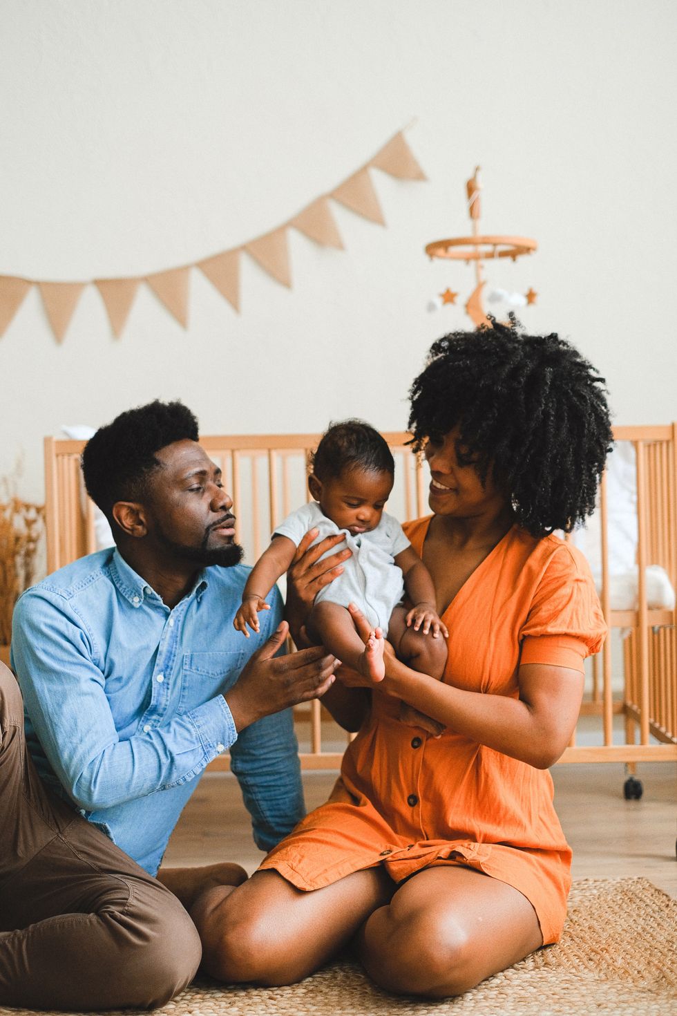 couple holding young infant