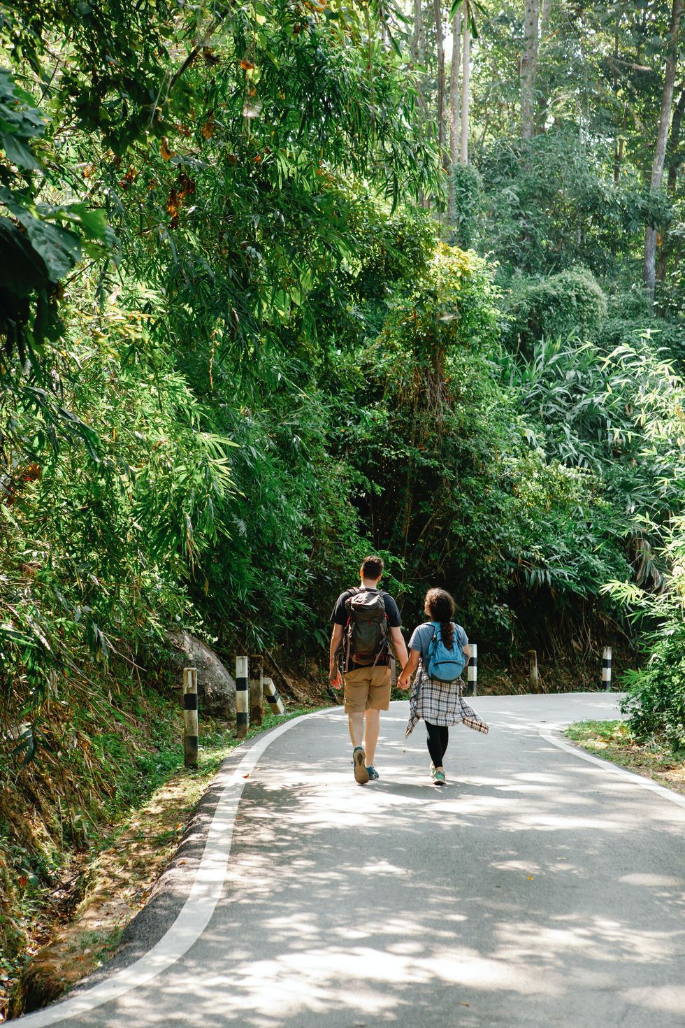 couple walking on hiking trail together