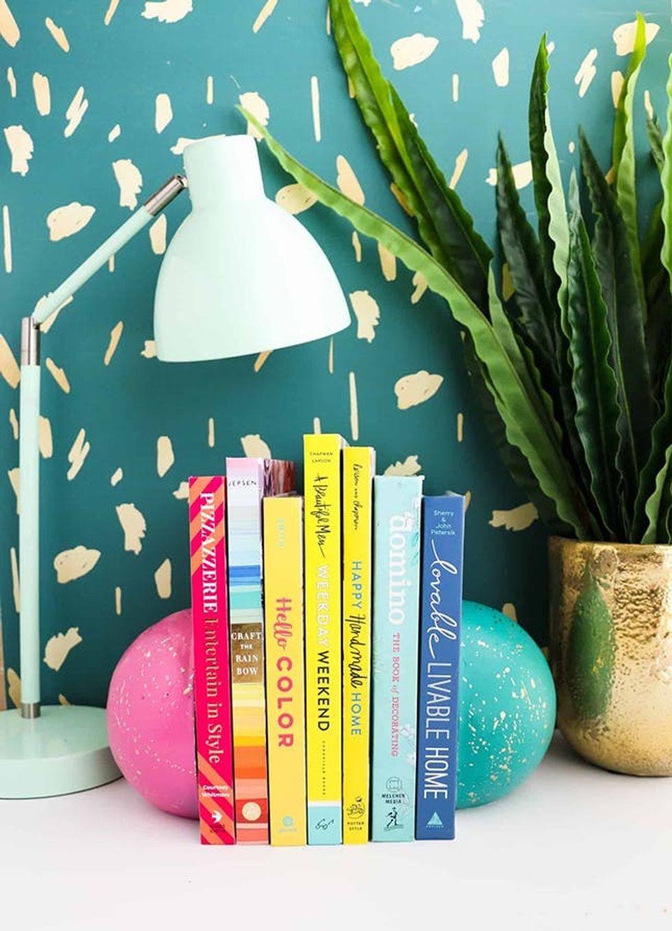 teal and gold DIY Splatter Concrete Bookends