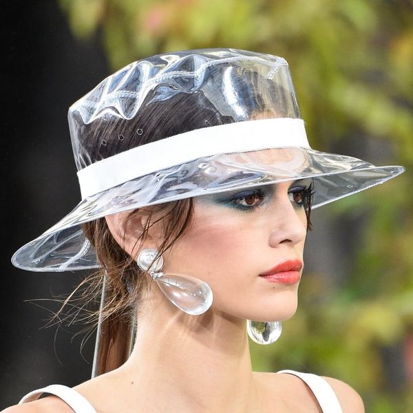 Chanel’s Plastic Rain Hats Will Cost You More Than $1K - Brit + Co