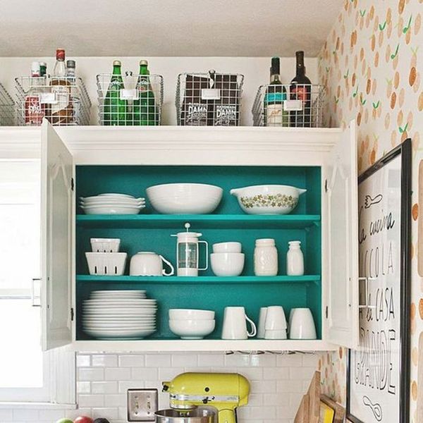 10 Genius Ways To Use That Awkward Space Above Your Kitchen Cabinets Brit Co