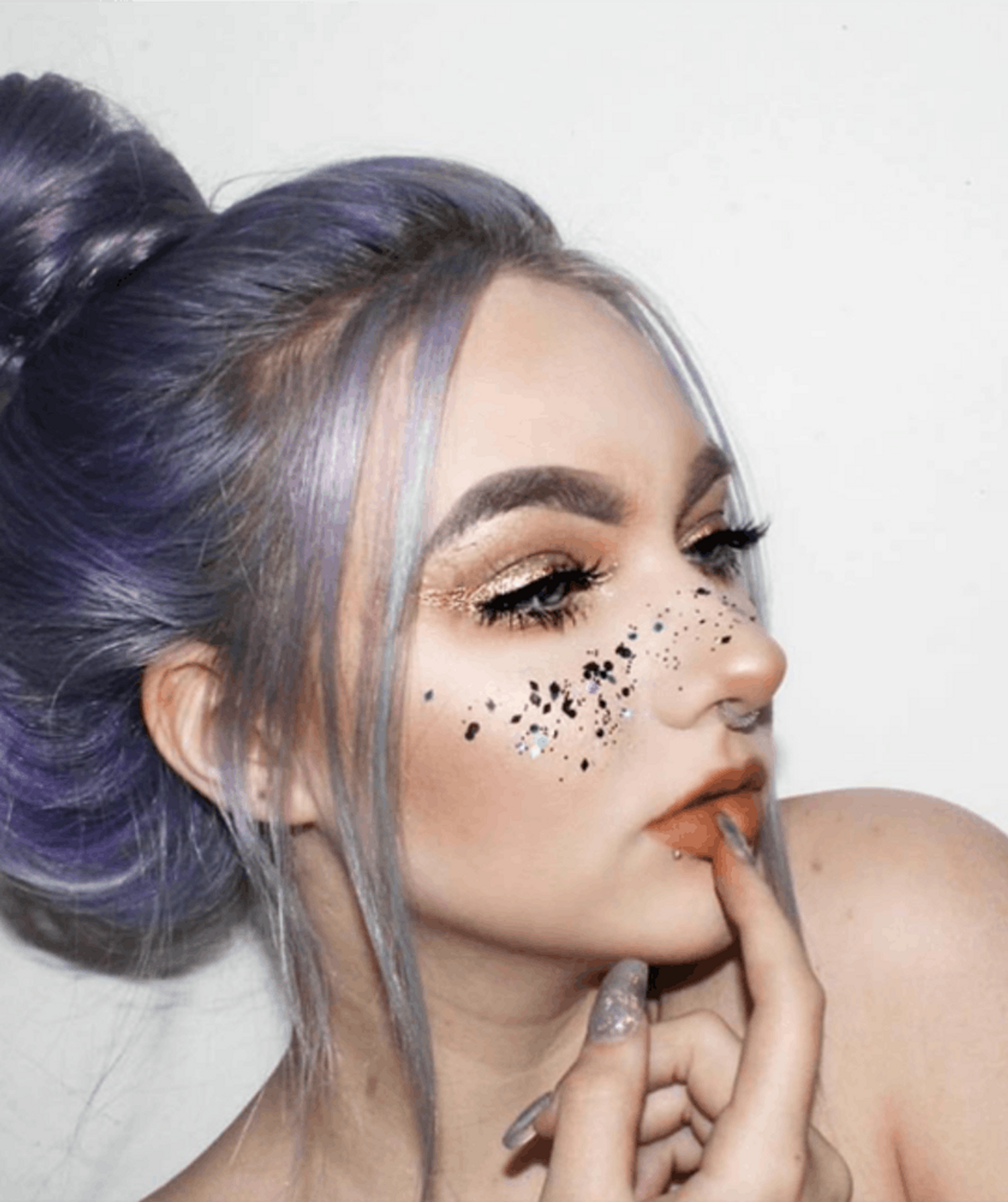 9 Ways Glitter Freckles Can Actually Enhance Your Beauty Routine