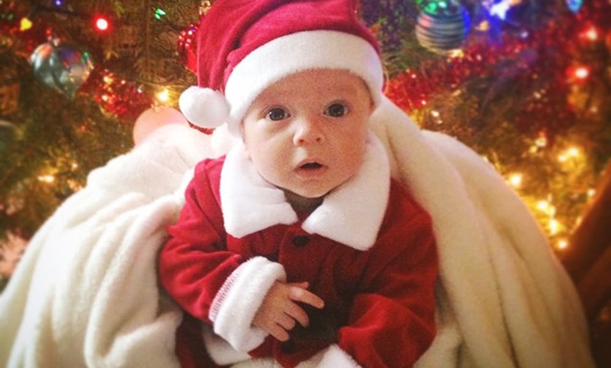 Holiday Cute Overload: 16 Pets + Babies Pretending to Be Santa - Brit + Co