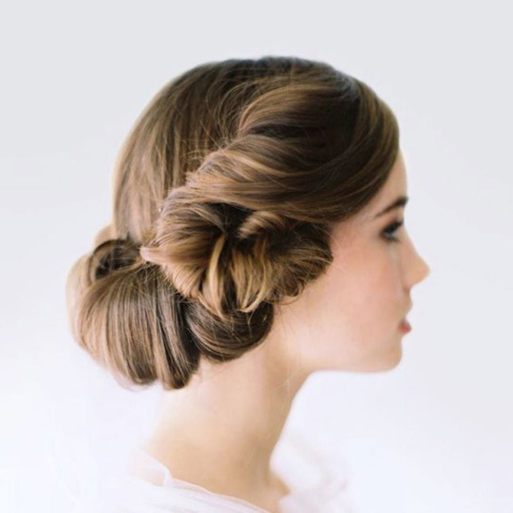 21 Wedding Updos That Go Way Beyond The Low Bun Brit Co   Image 