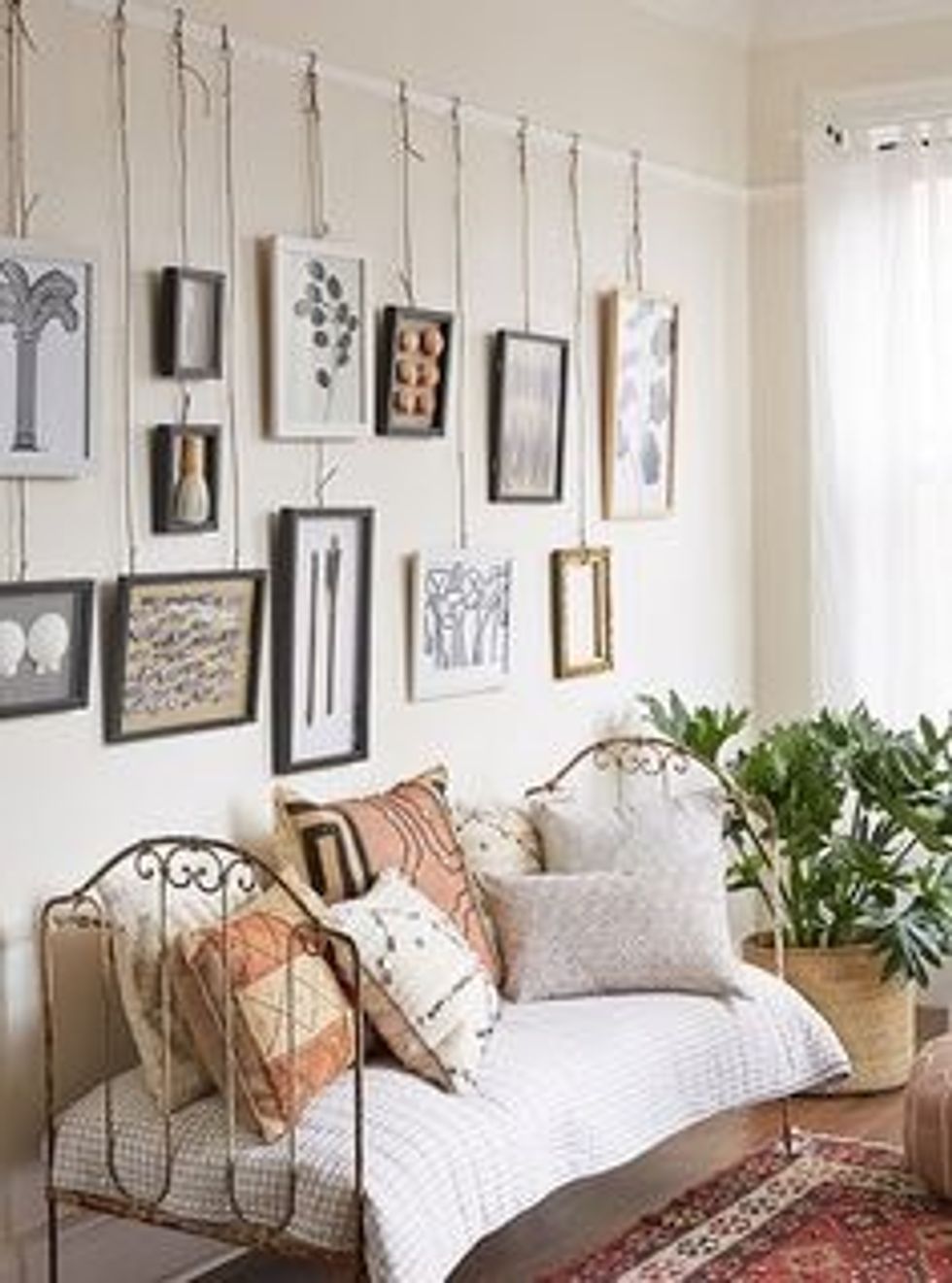 10 Wall Art Display Ideas That Aren’t Another Gallery Wall Brit + Co