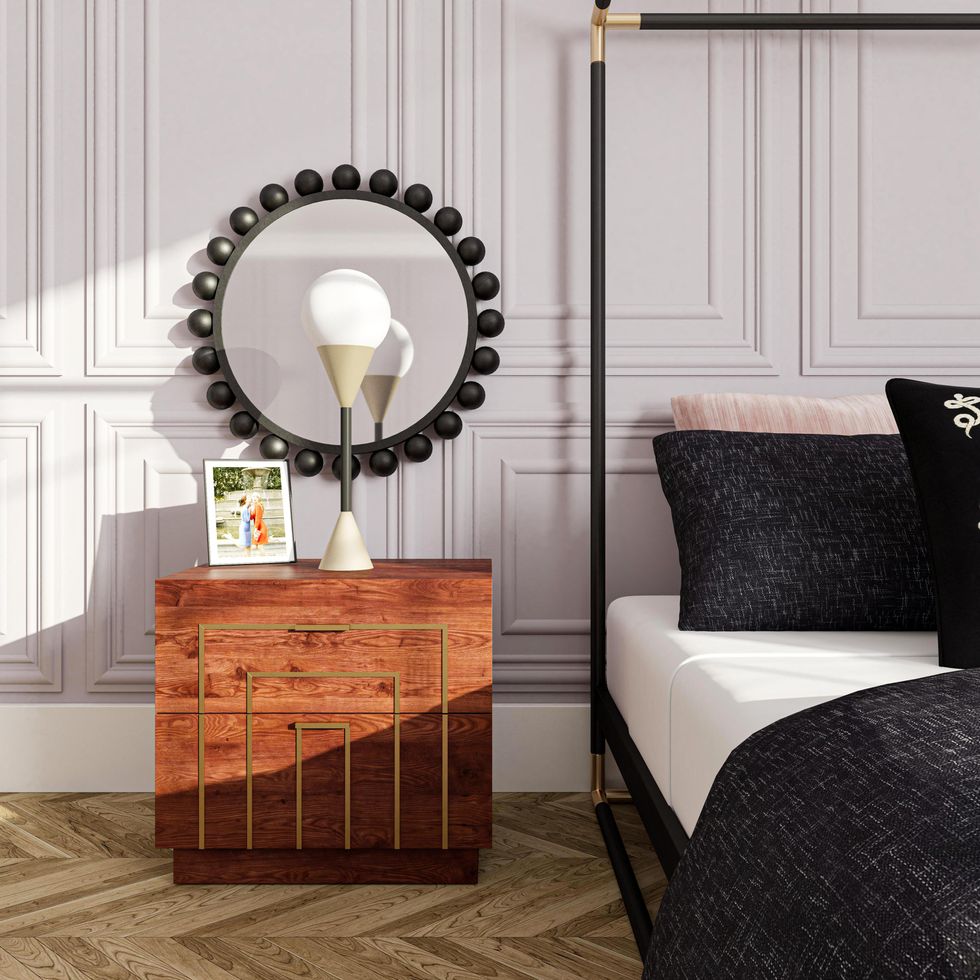 chuck bass and blair waldorf apartment with photo of blair with serena van der woodsen on a wooden night table