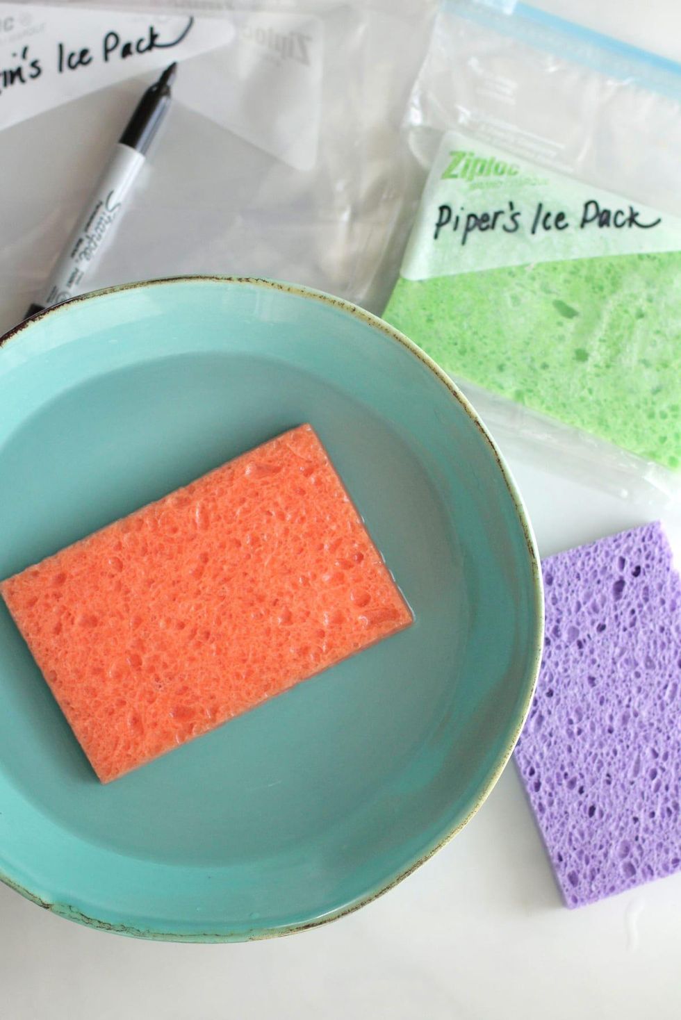 ice pack diy with different colored sponges and water