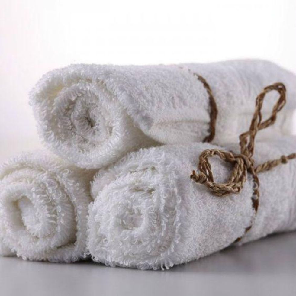 a trio of white cold towels