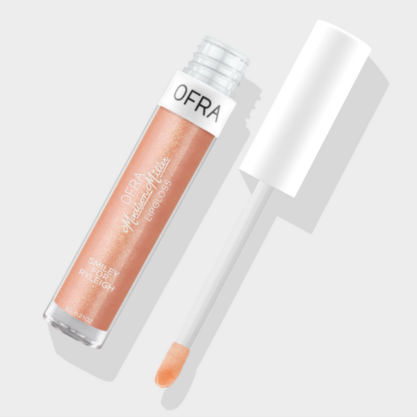 pink ofra lip gloss with white writing and white lid