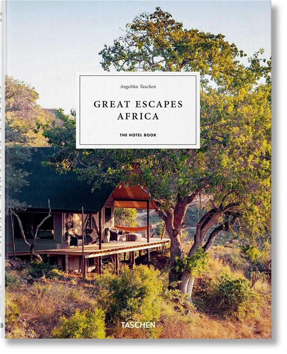 green tree and house in africa surrounded by bushes