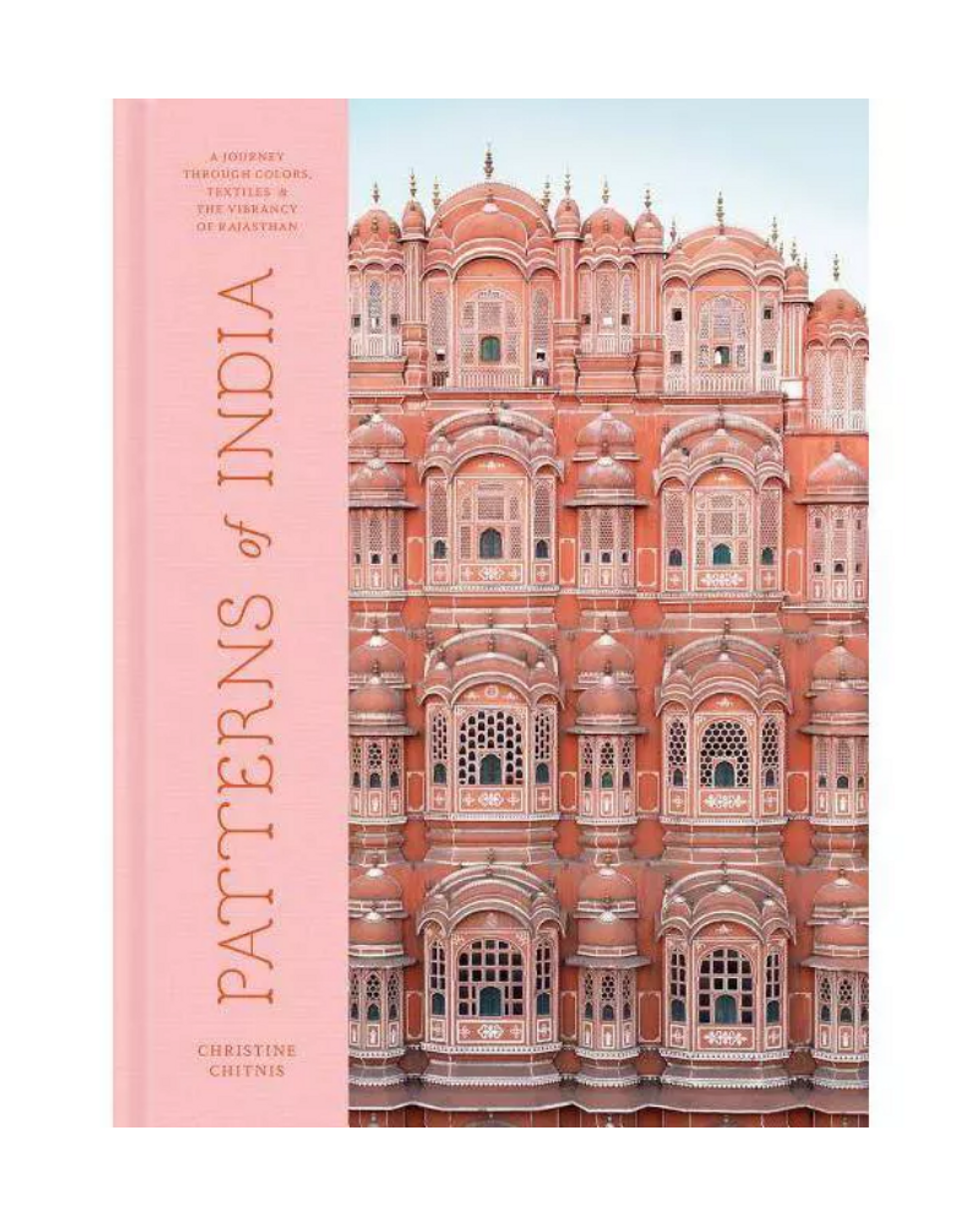 pink coffee table book with building in india on the front