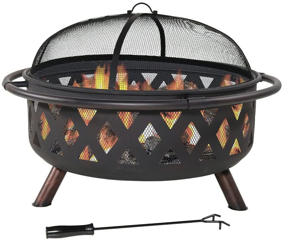 outdoor fire pit with poker and mesh cover