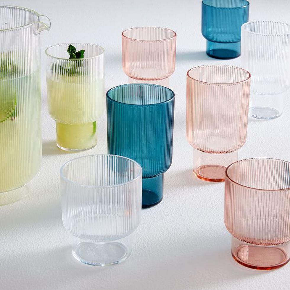 multicolored glassware with flutes for outdoor dining