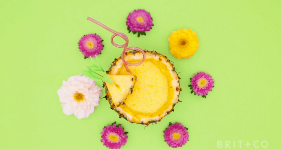 pineapple margarita surrounded by flowers