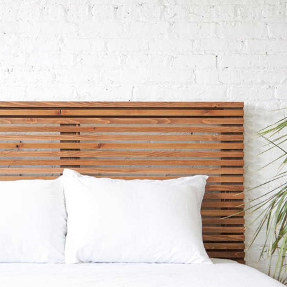 wooden slat at the head of a bed from etsy