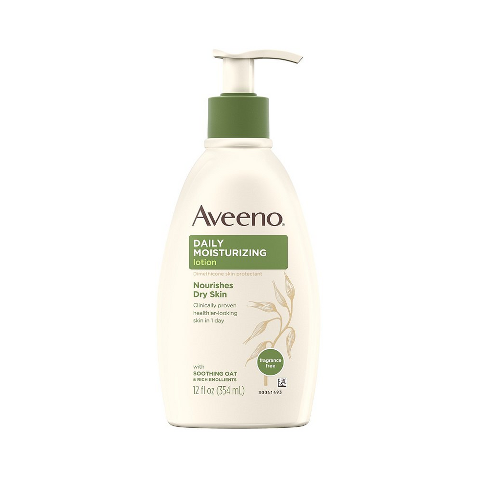 cream bottle of aveeno with green lettering