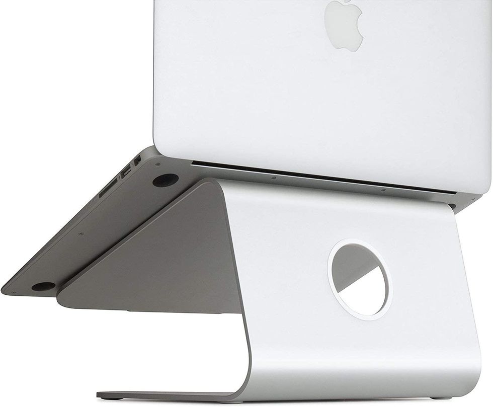 silver macbook pro laptop stand