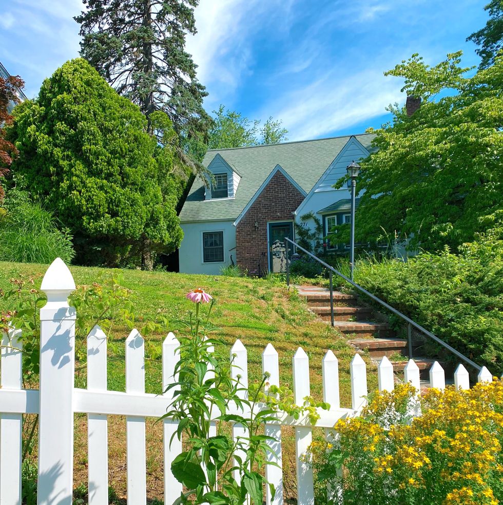 house with white picket fence