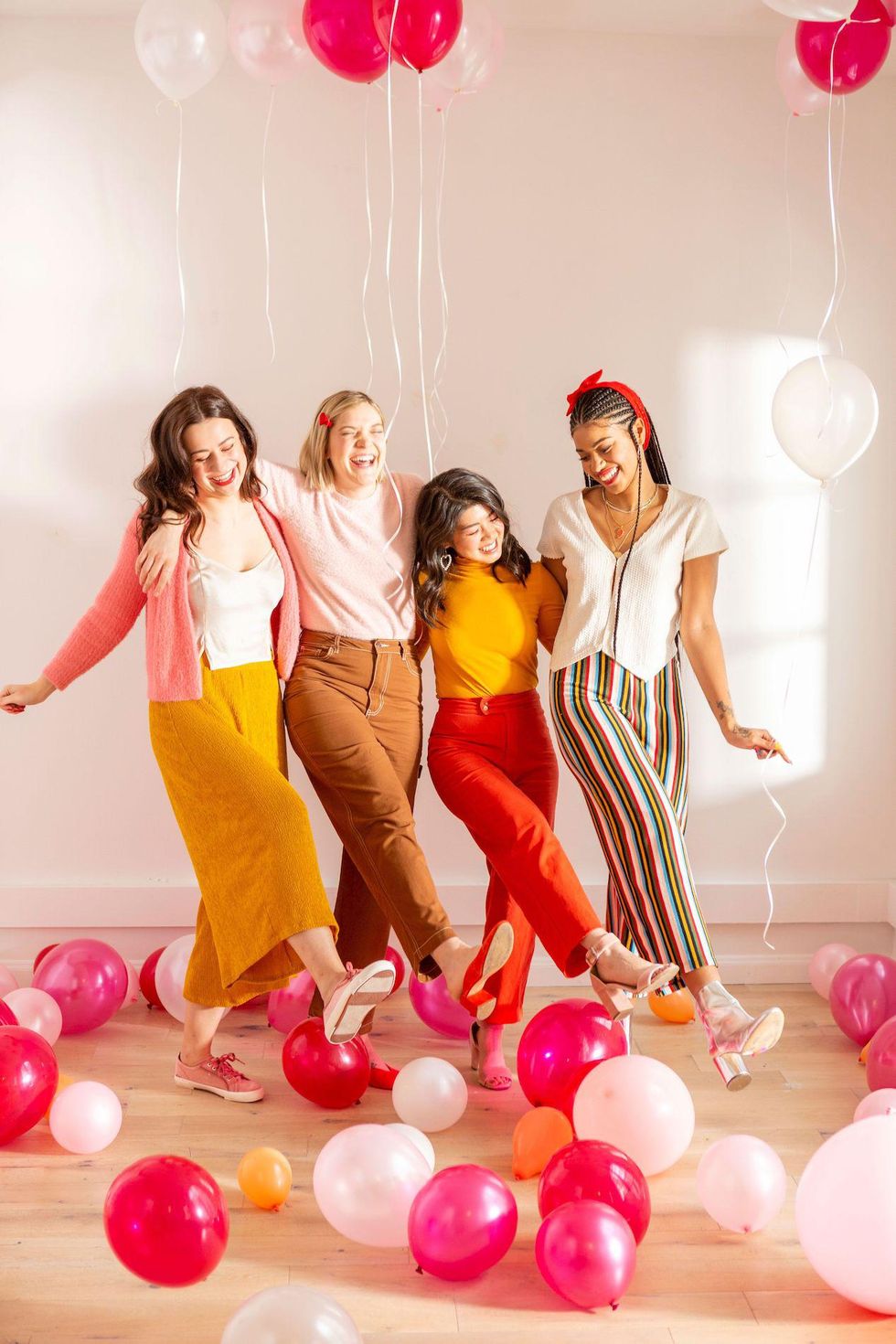 female friends dancing and hanging out together