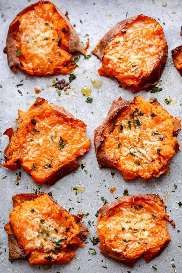 https://www.brit.co/media-library/garlic-butter-smashed-sweet-potatoes-with-parmesan.jpg?id=34343420&width=760&quality=90