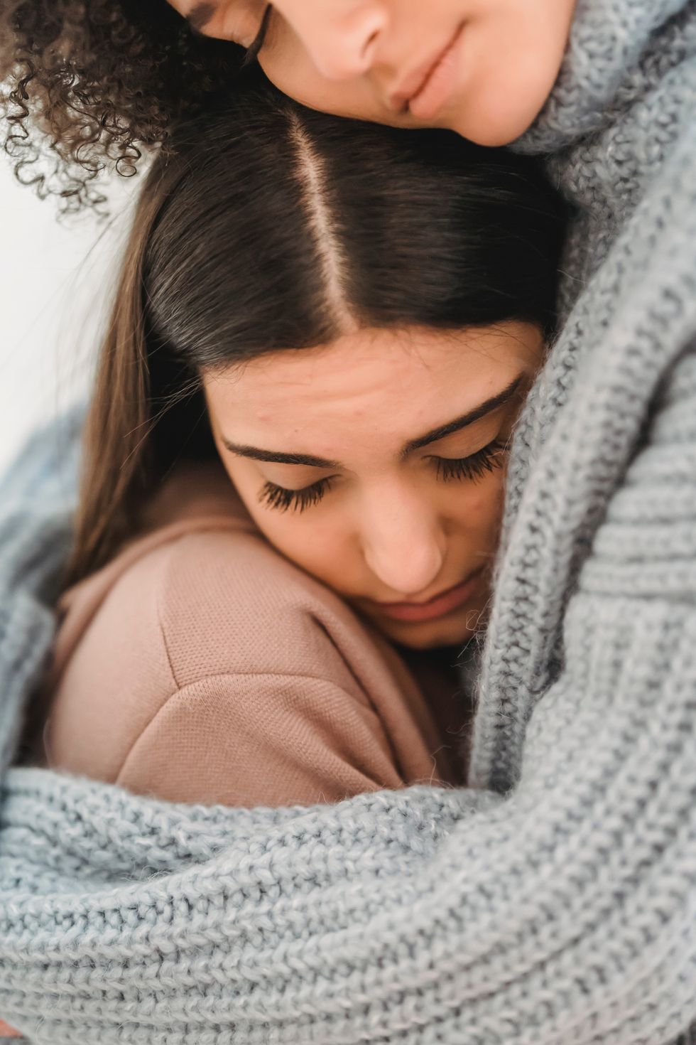 girl getting a comforting hug