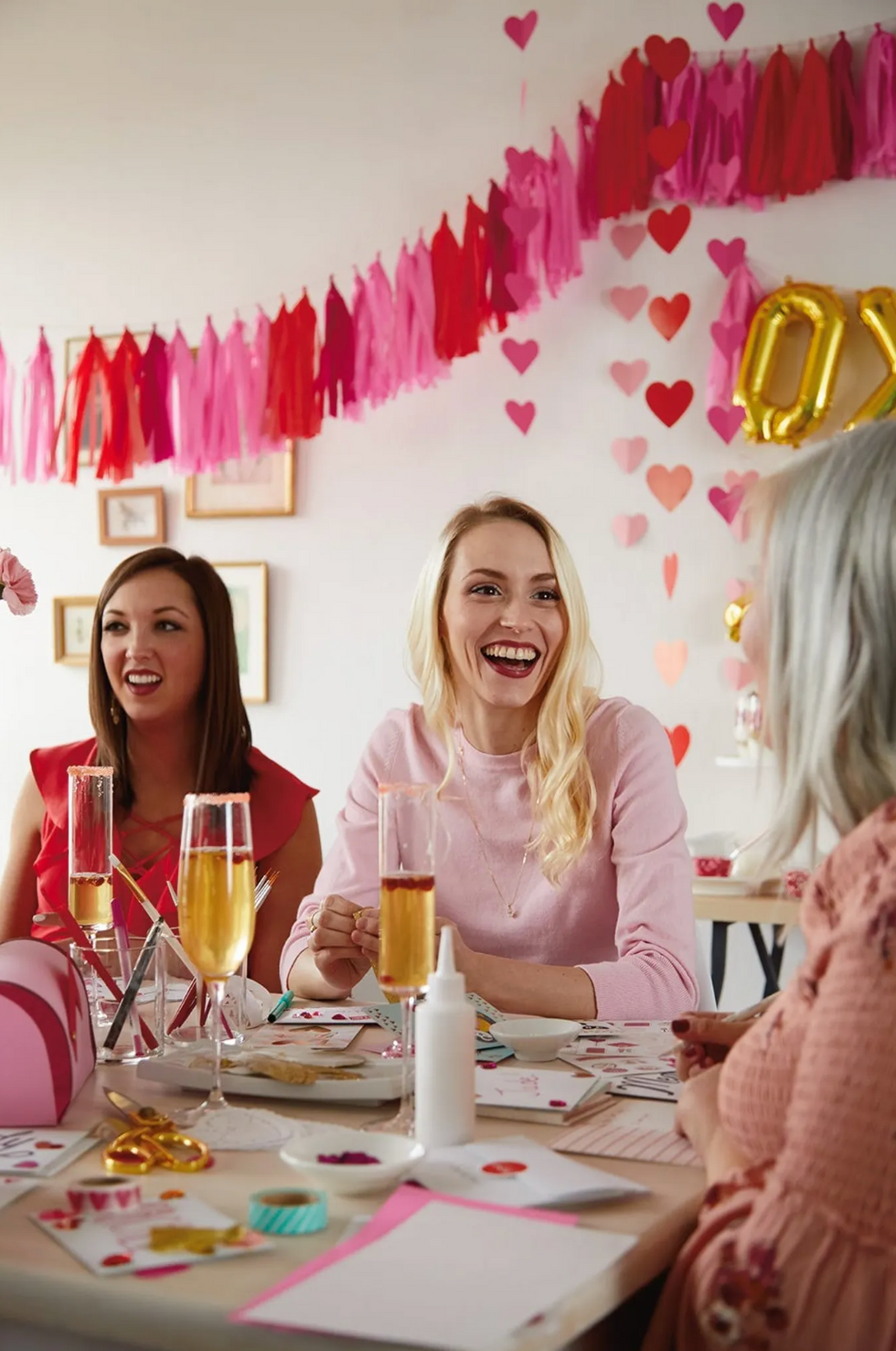 girls having fun celebrating a galentine's day brunch party