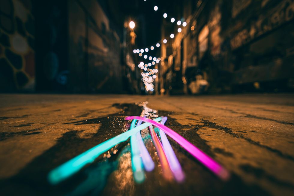 glow sticks on sidewalk