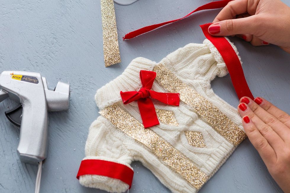 gluing ribbon onto the Ugly Sweater Ornaments