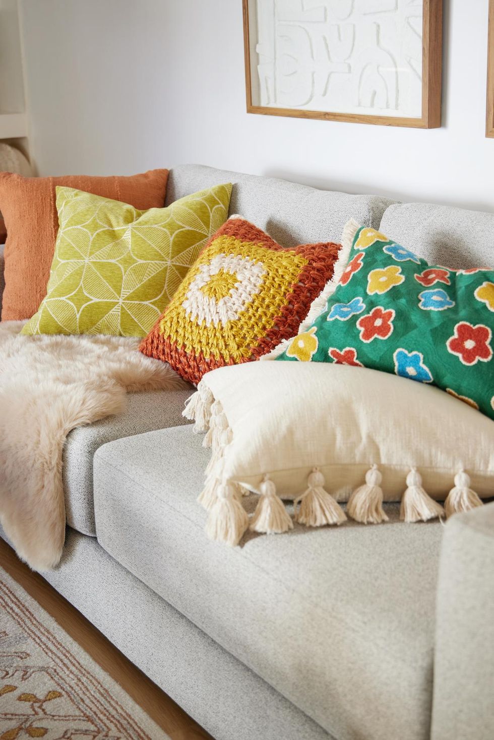 gray couch and colorful pillows