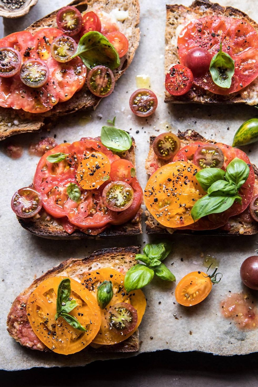 Heirloom Tomato, Basil, and Manchego Toast recipe via Half Baked Harvest