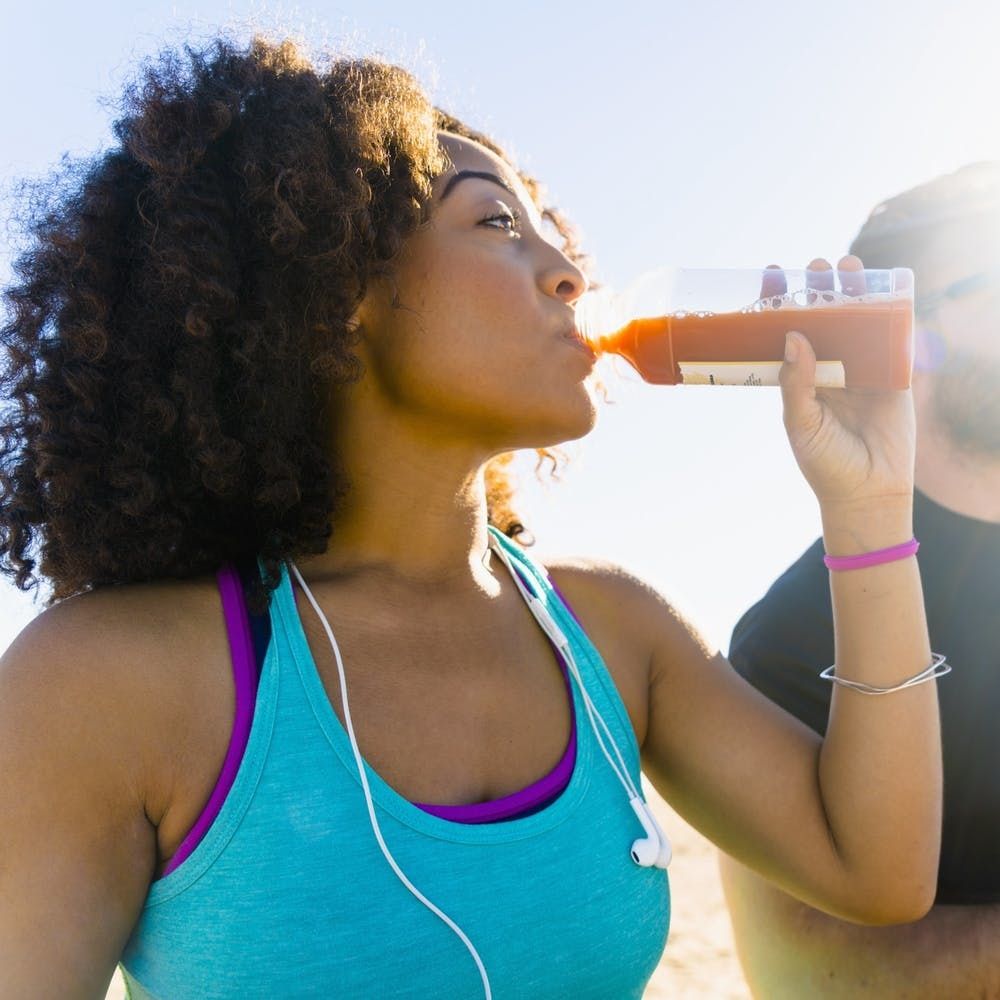 Woman drinking a sports drink