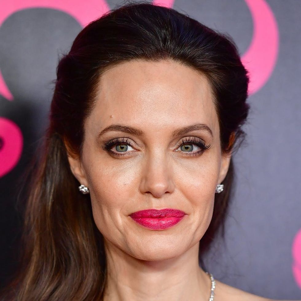 Angelina Jolie Walks Her Dog in Affordable Heels