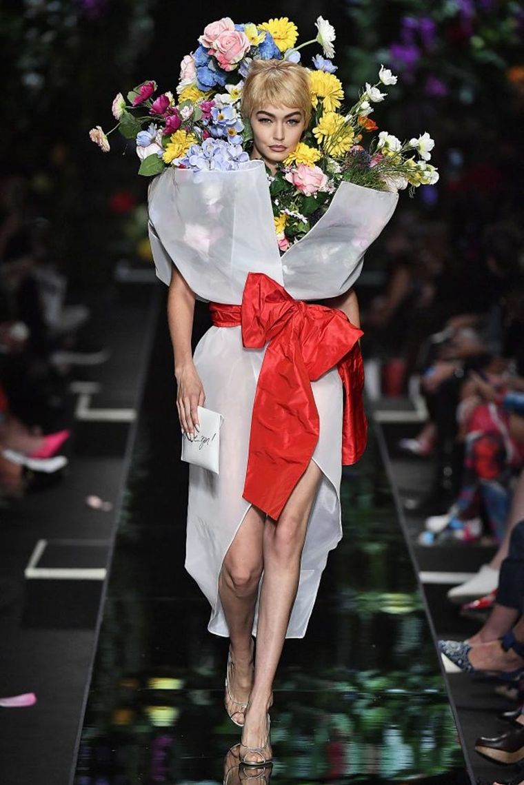 Gigi Hadid Wore a Flower Bouquet at the Moschino Runway Show