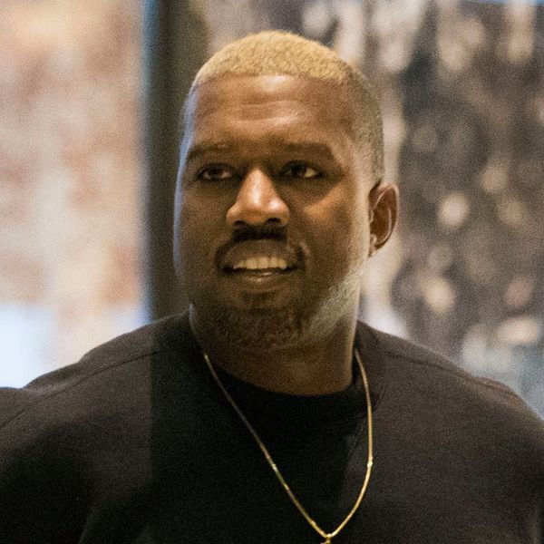 Kanye West with long pink hair