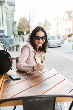 woman mindful drinking wine