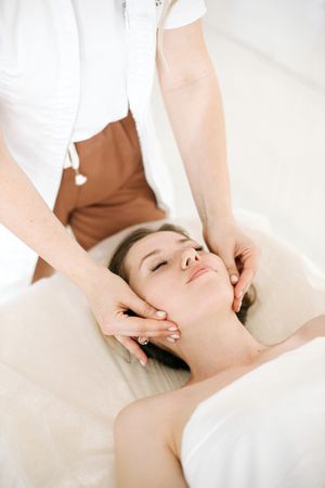 woman getting a lymphatic drainage massage