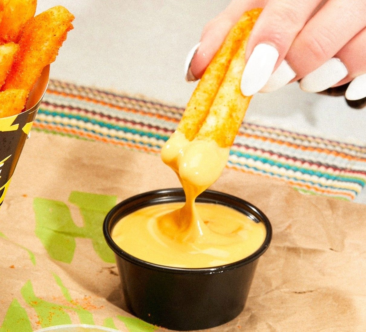 taco bell nacho fries with vegan nacho sauce