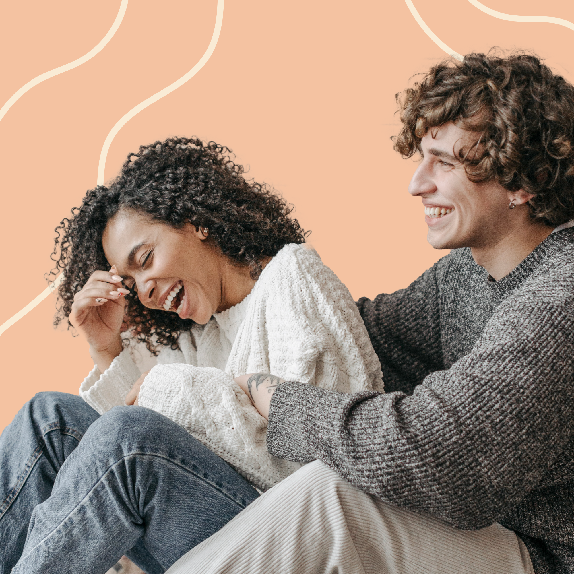 couple sitting and laughing together