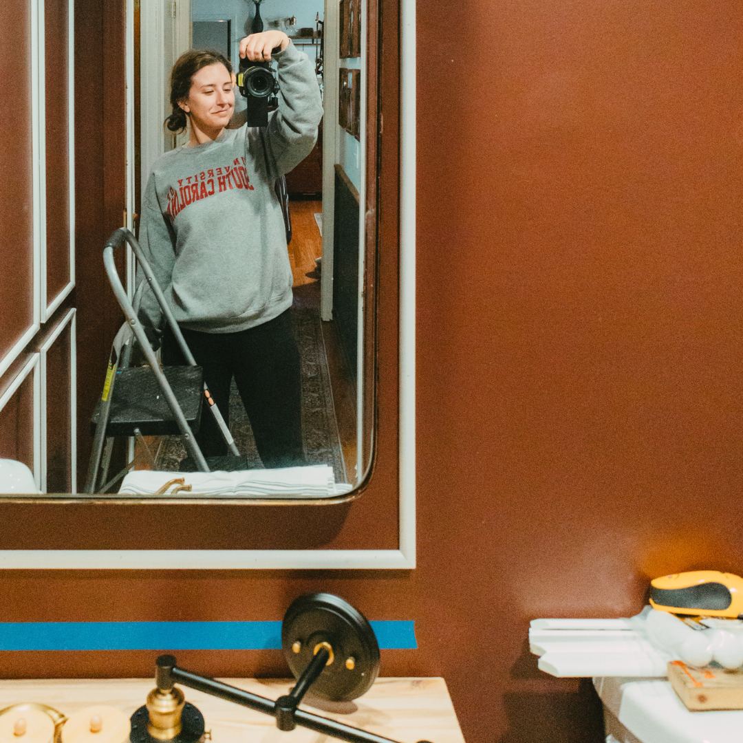 DIYer Mackenzie Edwards painting her small guest bathroom