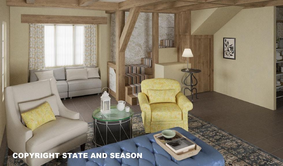 living room from the cottage with yellow chairs and striped stairs