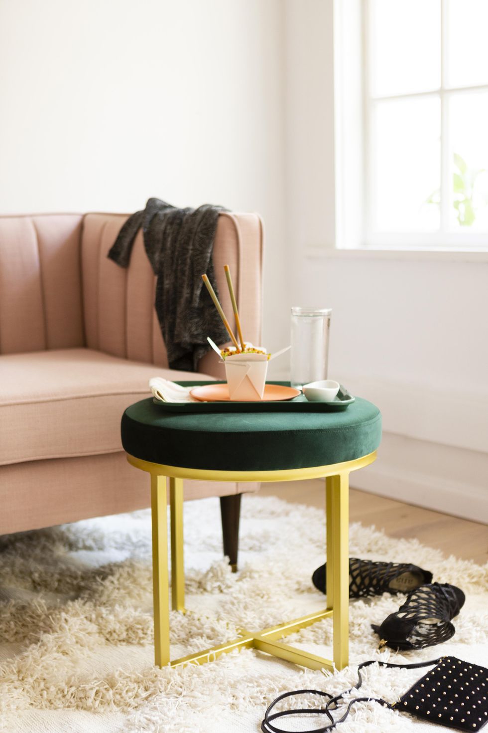 living room with takeout box and shoes lying around declutter