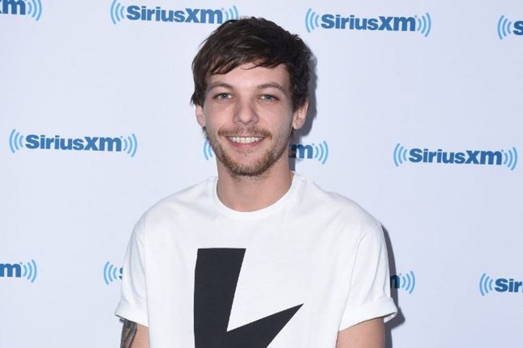 Louis Tomlinson feared he was 'forgettable' in One Direction as he reveals  why people are more interested in Harry Styles