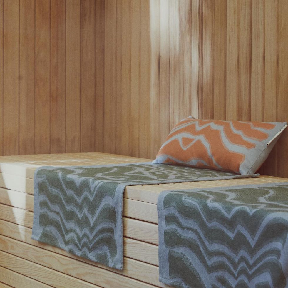 multicolored towels and cushion for the sauna